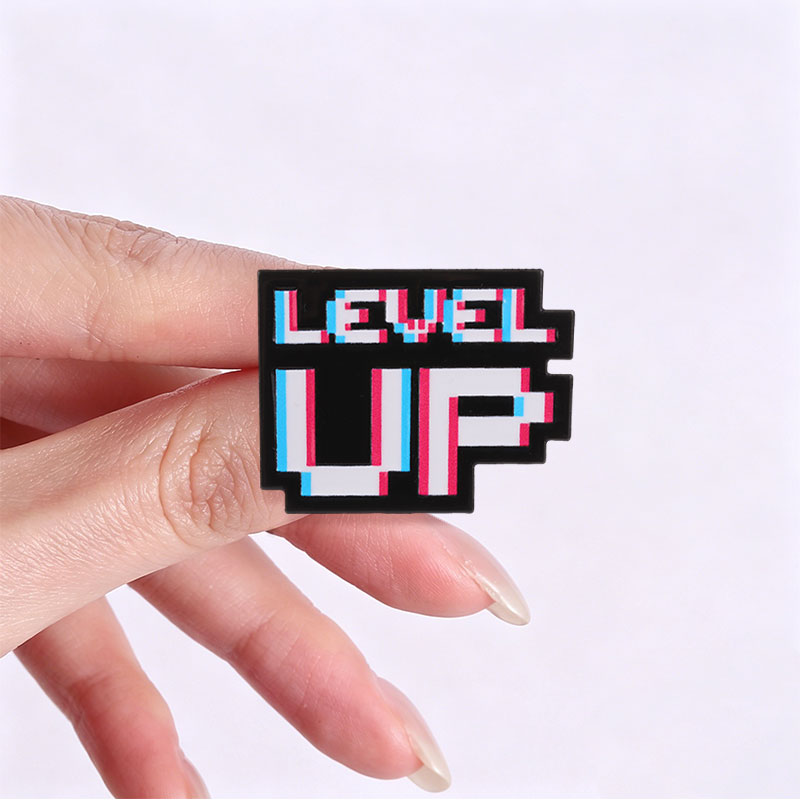 Distintivo Level Up Glitch Pix - Gaming Accessories Retro recensione e prezzo